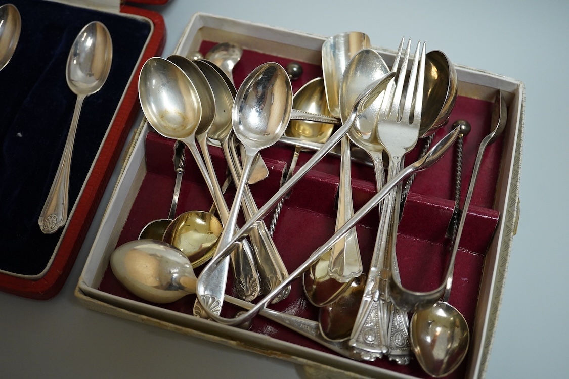 A cased set of five(ex 6) silver teaspoons and pair of sugar tongs, a set of six shell end coffee spoons, five other silver items of flatware, a boxed set of six 830 standard white metal teaspoons, an 800 standard shovel